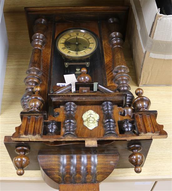 A mahogany wall clock